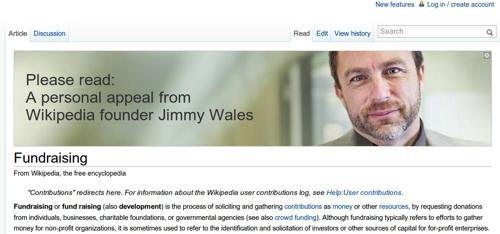 Джимми Уэйлс (на баннере) просит читателей Wikipedia подать на сайт
